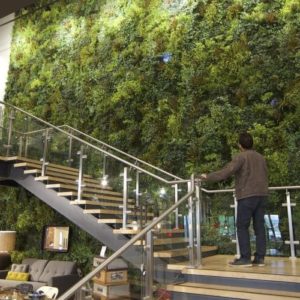 Artificial living wall by restaurant staircase