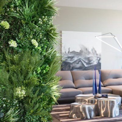 Close up of White-Flowers within artificial green wall