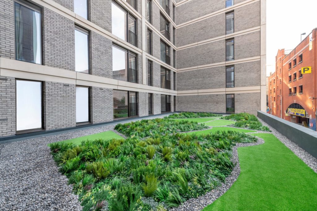 an artificial green roof installation