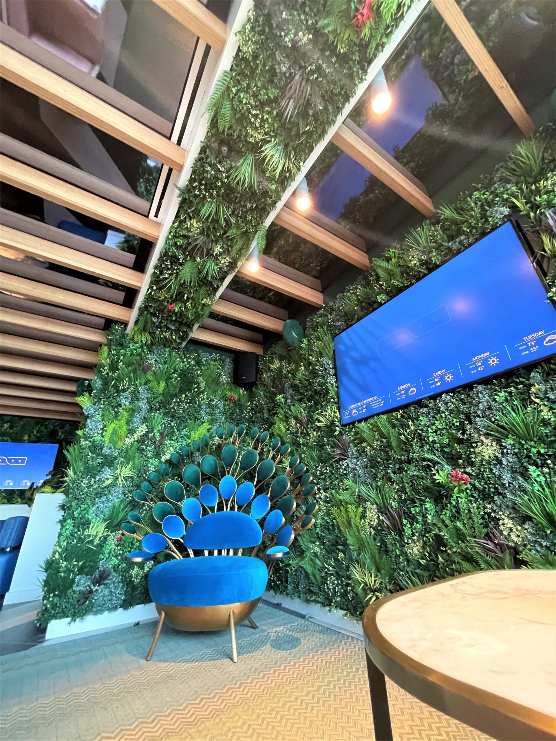 Faux green wall installation in a restaurant in Orlando, Florida