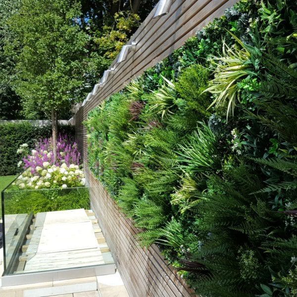 Living wall on outdoor fence. 