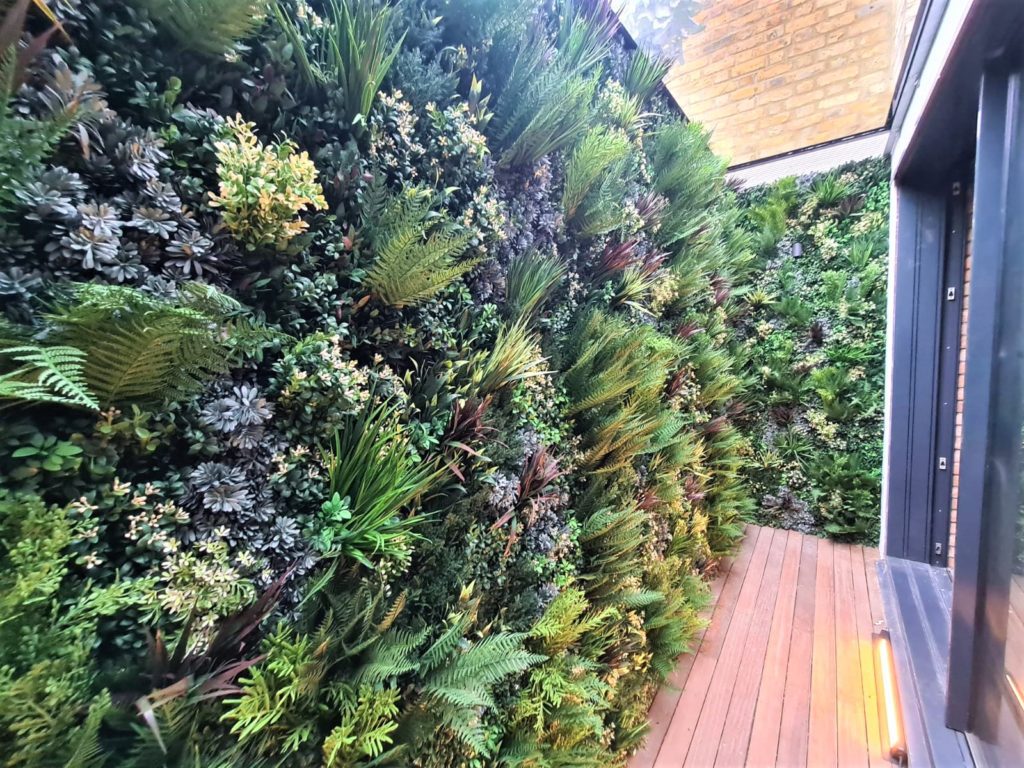 Faux Green wall installation in a London lightwell