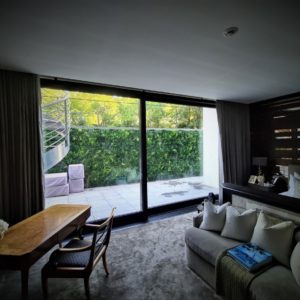 Artificial Green Wall seen from a Hyde Park Property bedroom