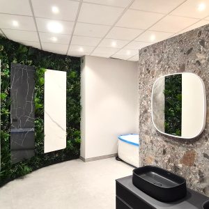 Vistafolia artificial green wall in a bathroom showroom in Windsor