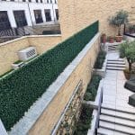 An installation of Vistafolia Artificial Boxwood Panels in a London Garden